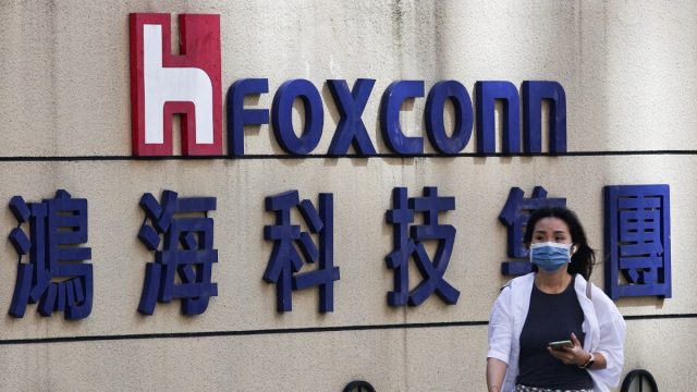 Foxconn, Dixon Said to Urge Government to Pay Pending Production Subsidies