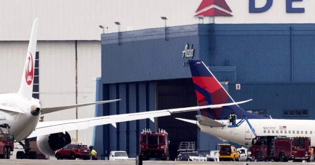 Japan Airlines Plane Clips Delta Plane at Seattle-Tacoma Airport