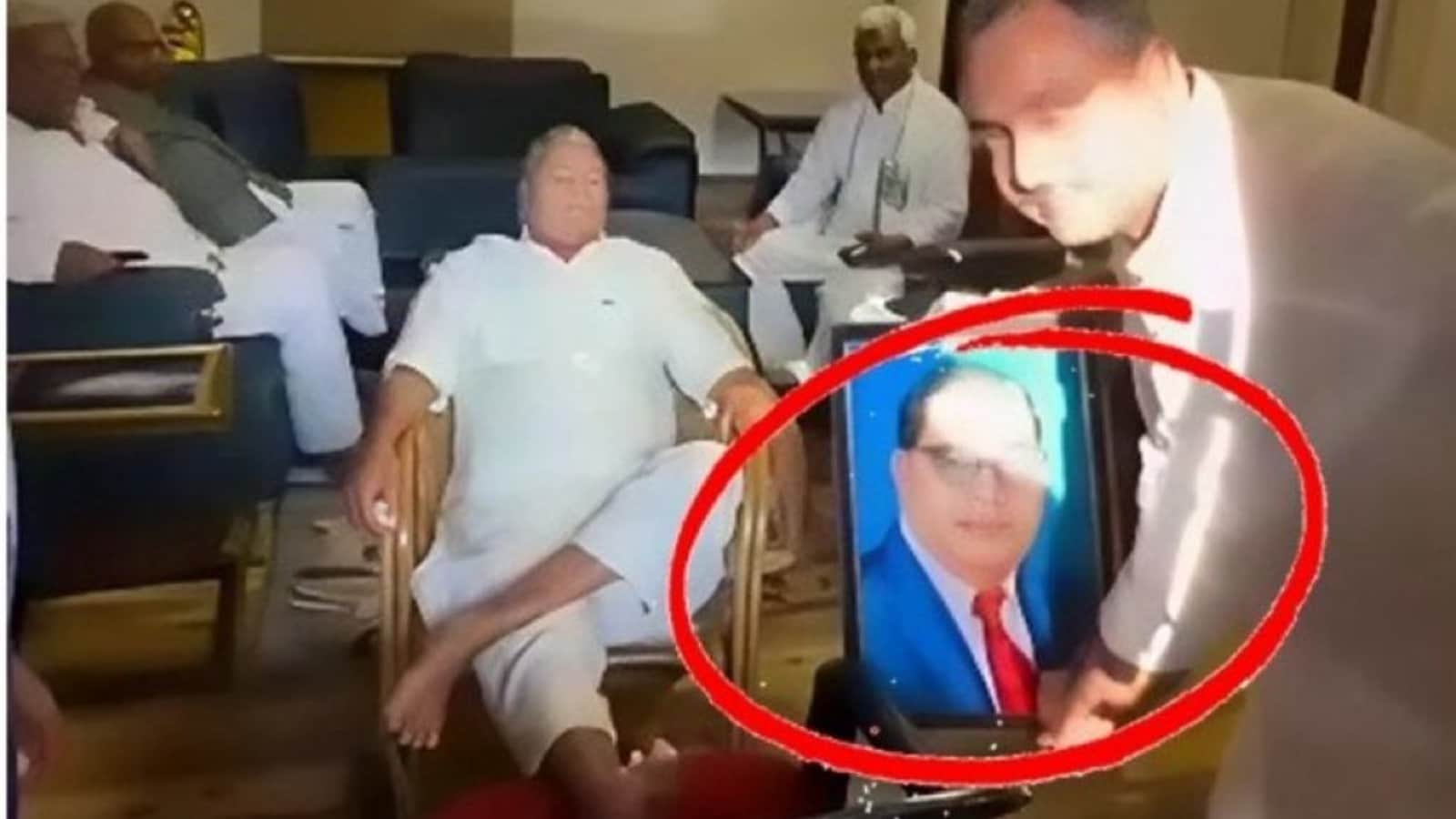 BJP Takes ‘Charitra’ Jibe At RJD Over Lalu Prasad’s Viral Pic With Ambedkar’s Portrait